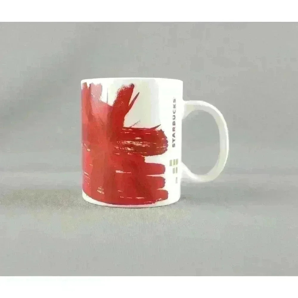 Starbucks 2014 Red Poinsettia Starburst Holiday Christmas Coffee Mug / Tea Cup